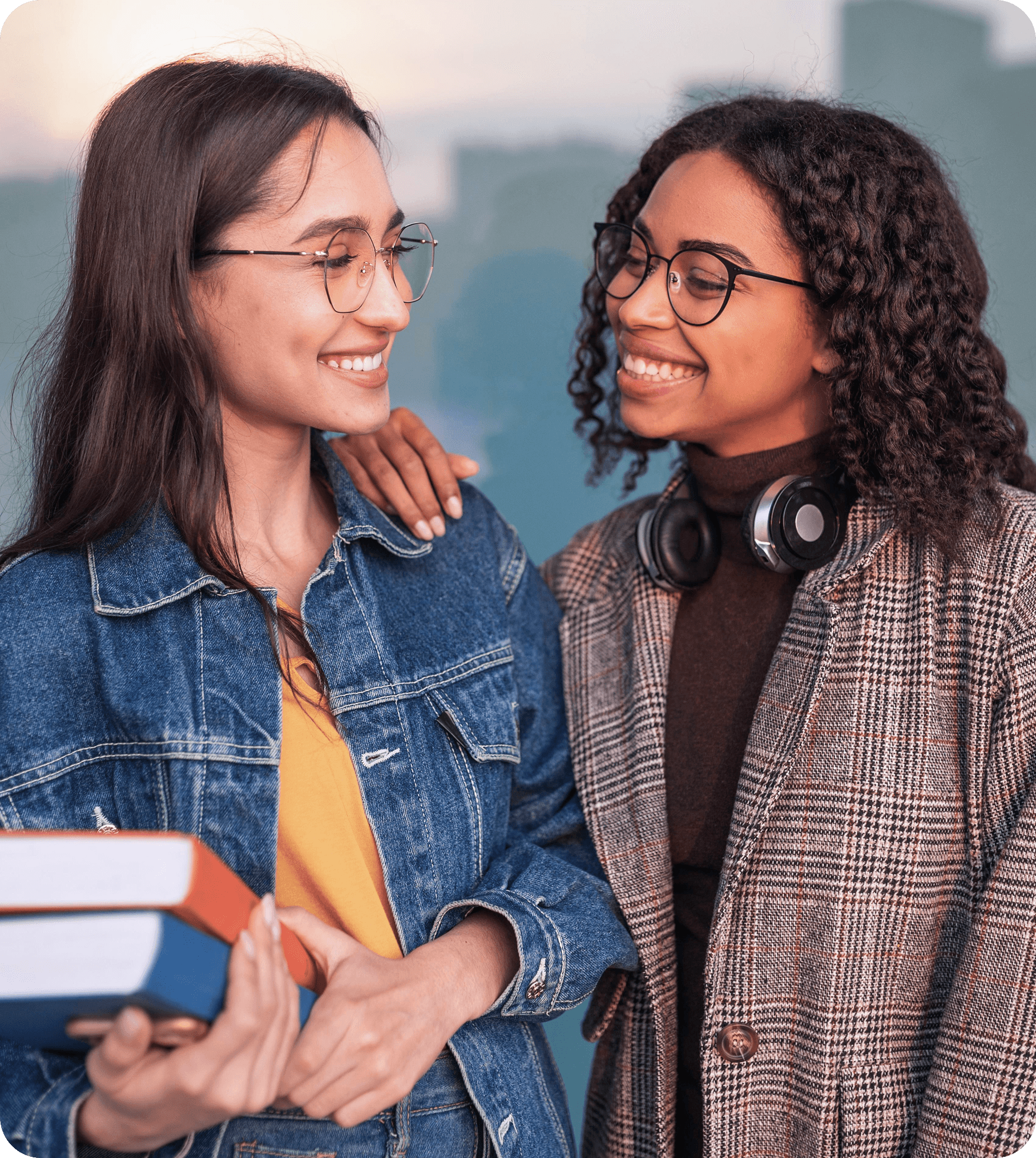 Two students smiling together