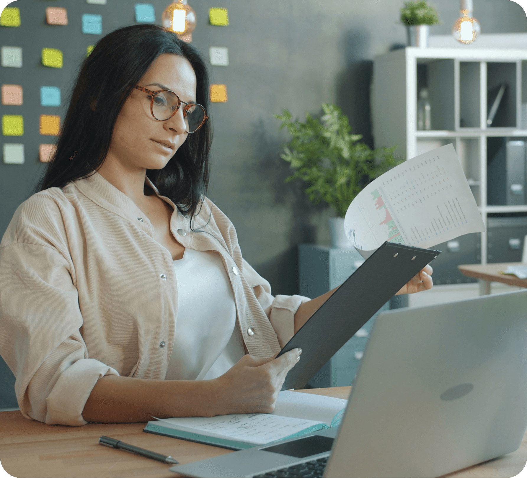 Professional reviewing care data at a desk